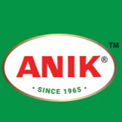 "ANIK logo featuring bold red uppercase letters centered in a white oval with a golden border. Below the brand name, the tagline 'Since 1965' is written in green. The logo is set against a solid green background with a small trademark symbol (™) in the to